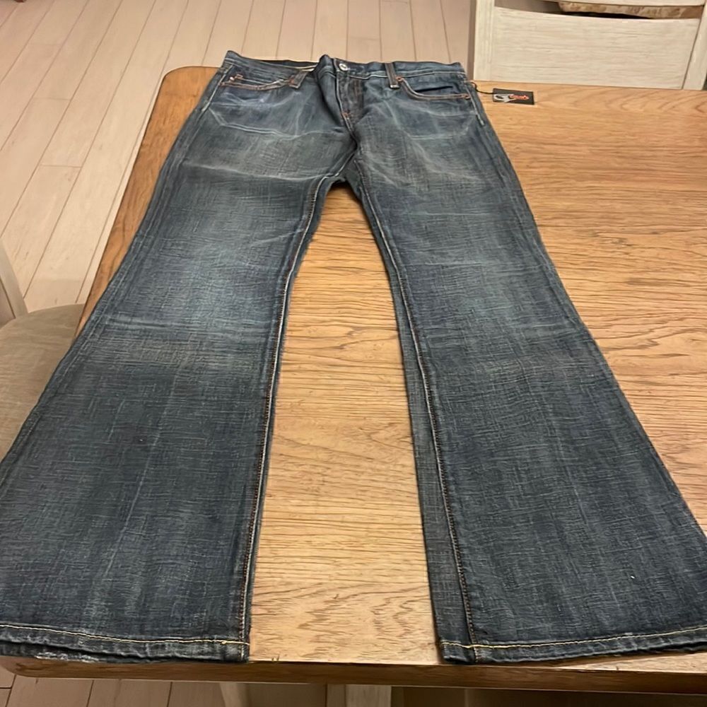 COLINS FLARE JEANS.  NEW WITH TAGS